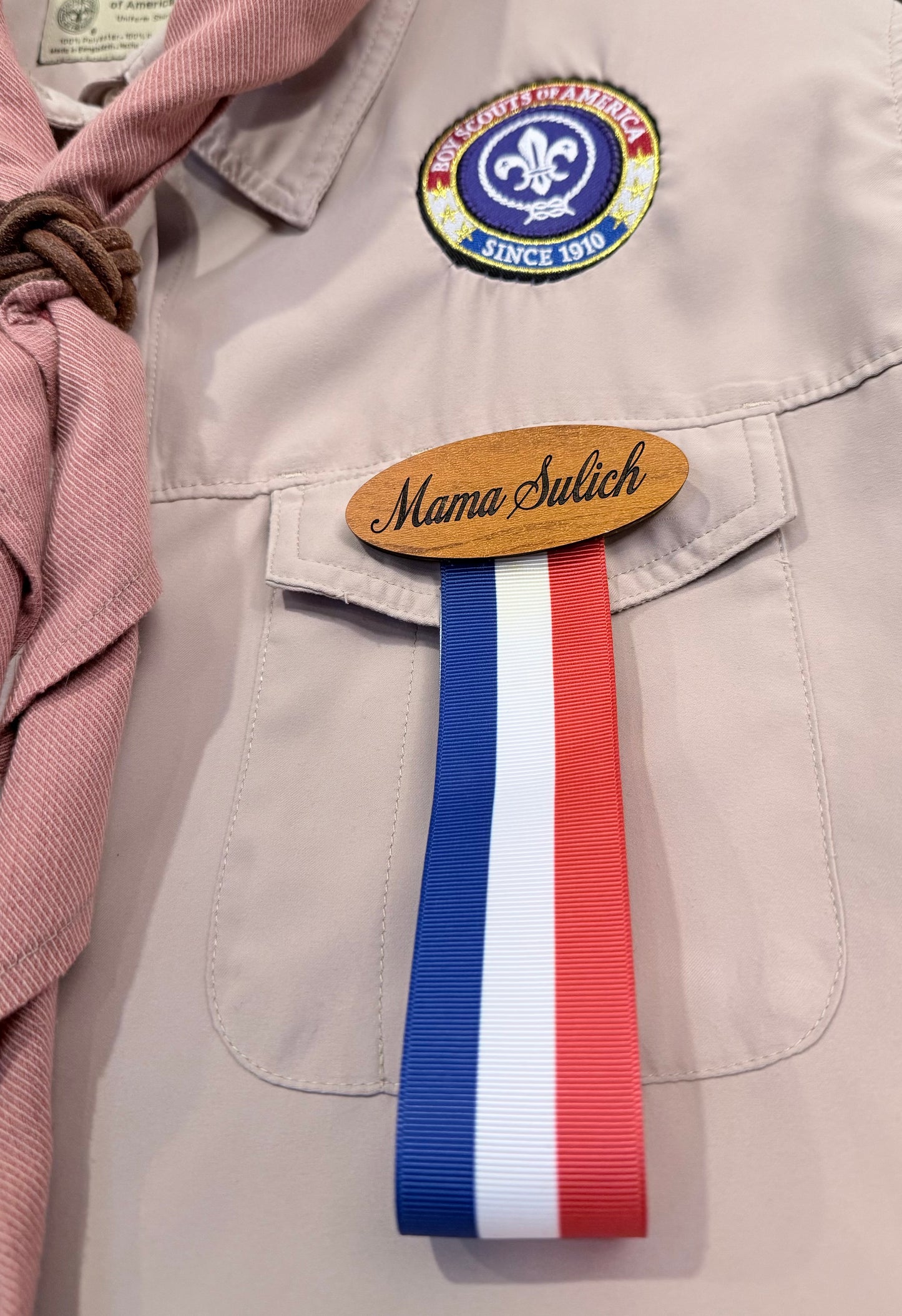 Name tag with ribbon for pins