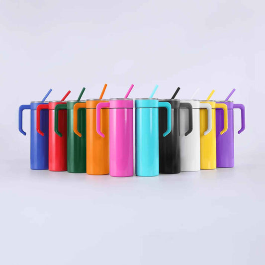Row of colorful insulated travel mugs with straws on a light gray background