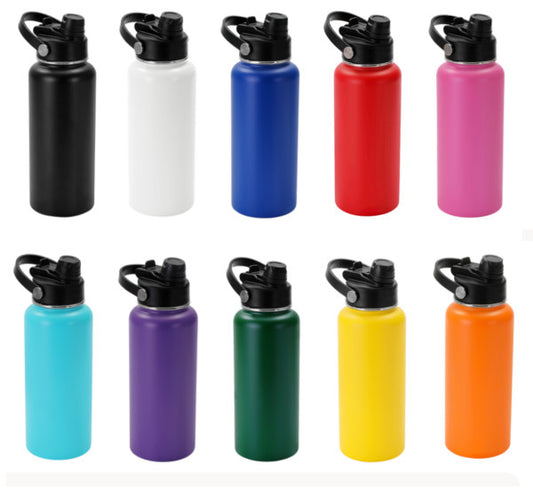 Set of colorful water bottles with black lids on a white background