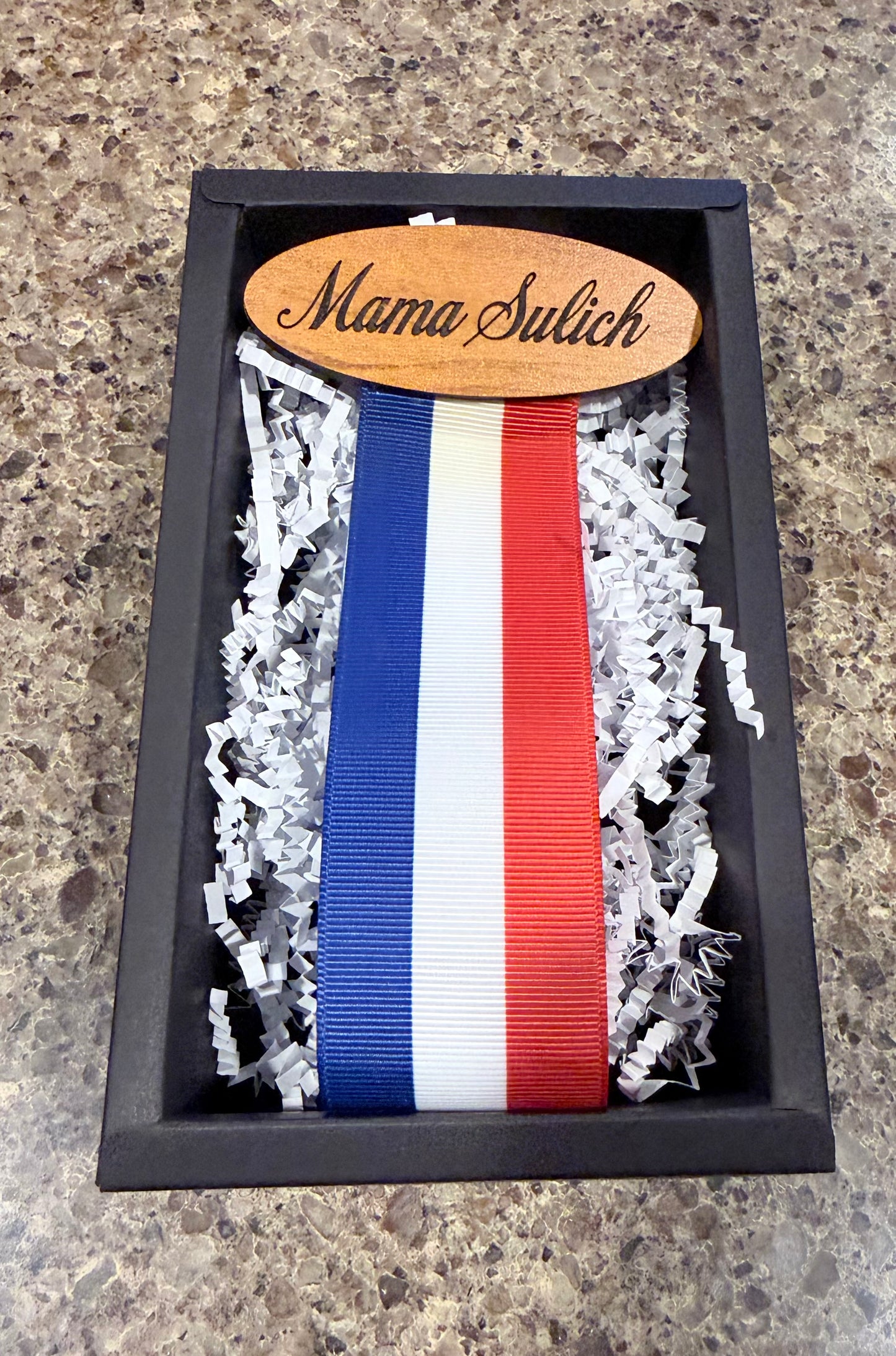 Name tag with ribbon for pins