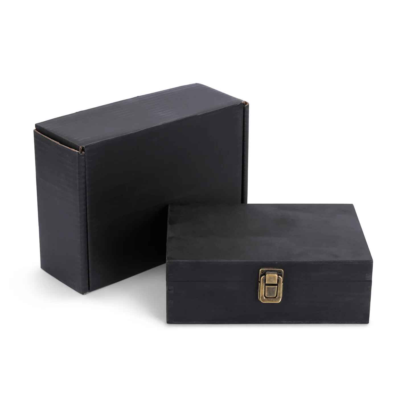 Two black jewelry boxes with a gold clasp on a white background